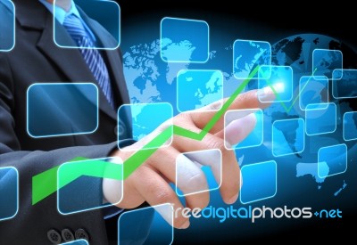 Hand Pushing A Business Graph Stock Photo