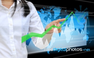 Hand Pushing A Business Graph Stock Photo