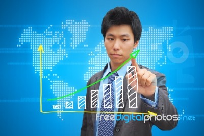 Hand Pushing A Business Graph Stock Photo