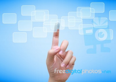 Hand Pushing A Button On A Touch Screen Interface Stock Photo