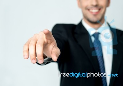 Hand Pushing On A Touch Screen Stock Photo