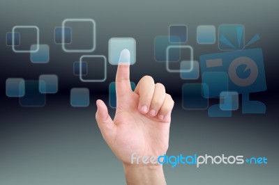 Hand Pushing Touch Screen Interface Stock Photo