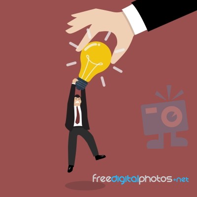 Hand Stealing Idea Light Bulb From Businessman Stock Image