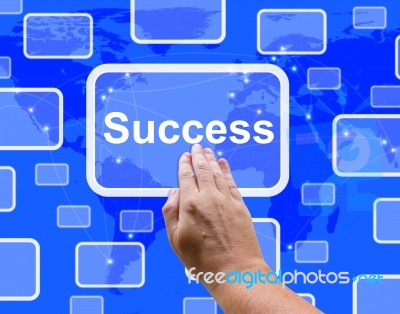 Hand Touching Success Button Stock Photo