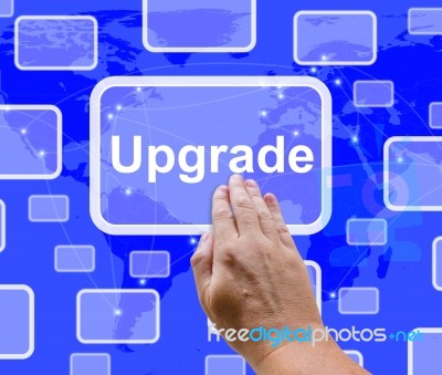 Hand Touching Upgrade Button Stock Photo