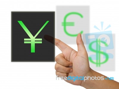 Hand touching yuan symbol Stock Photo