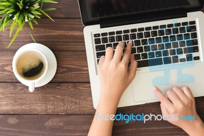 Hand Using Laptop Computer On Top View Stock Photo