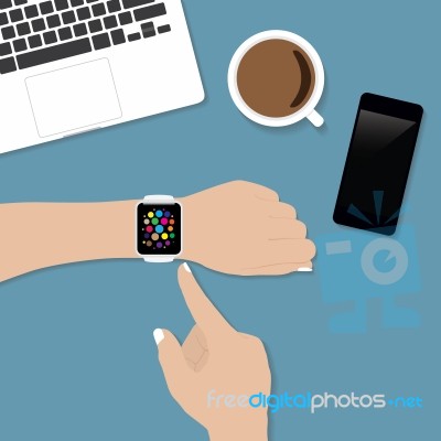 Hand Using Smart Watch On Desk Stock Image