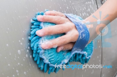 Hand Washing Brown Car With Blue Sponge And Bubbles (foam) Stock Photo