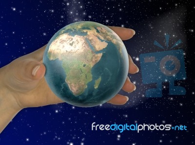 Hand With Earth Stock Photo