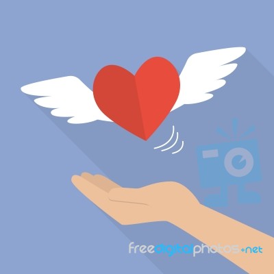 Hand With Heart Flying Stock Image