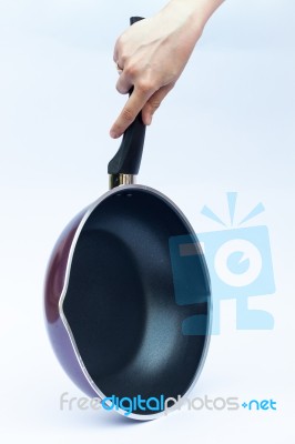 Hand With Non Stick Frying Pan On White Background Stock Photo