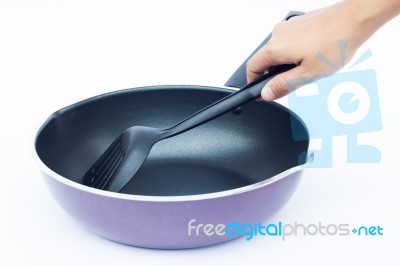 Hand With Non Stick Frying Pan On White Background Stock Photo