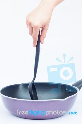 Hand With Non Stick Frying Pan On White Background Stock Photo