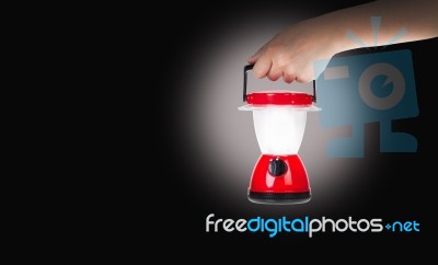 Hand Woman Holding Plastic Electric Lantern Stock Photo