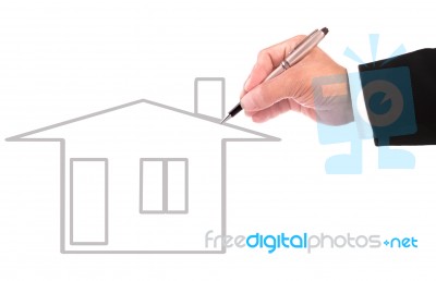 Hand Writing Outline Of Home On White Background Stock Photo