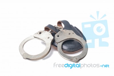 Handcuffs Isolated In White Stock Photo