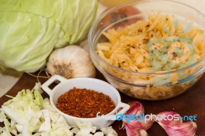 Handmade Preparation Of Sauerkraut And Cabbage Kimchi Stock Photo