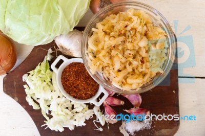 Handmade Preparation Of Sauerkraut And Cabbage Kimchi Stock Photo