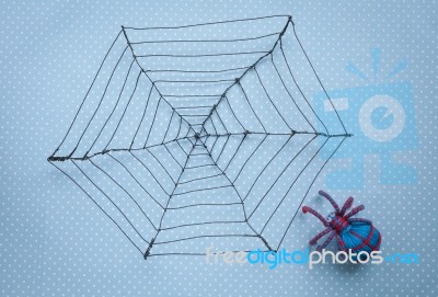 Handmade Spider Web With Blue Spider Stock Photo