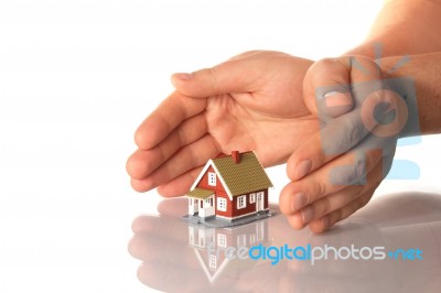 Hands And Little House Stock Photo