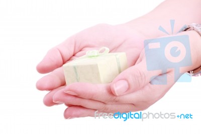 Hands Giving A Gift Stock Photo