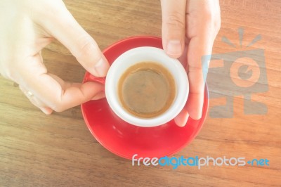 Hands Holding Cup Of Hot Coffee Stock Photo