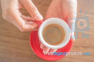 Hands Holding Cup Of Hot Coffee Stock Photo