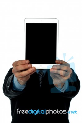 Hands Holding New Tablet Device For Sale Stock Photo