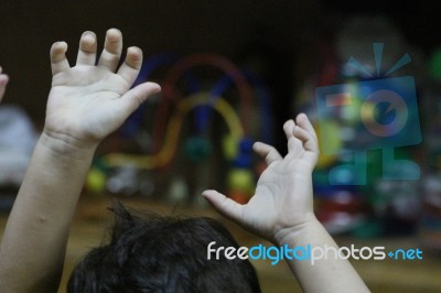 Hands Of A Child Stock Photo