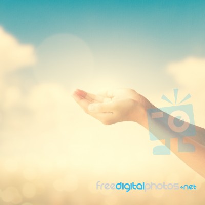 Hands Of Little Girl On Natural Background Stock Photo