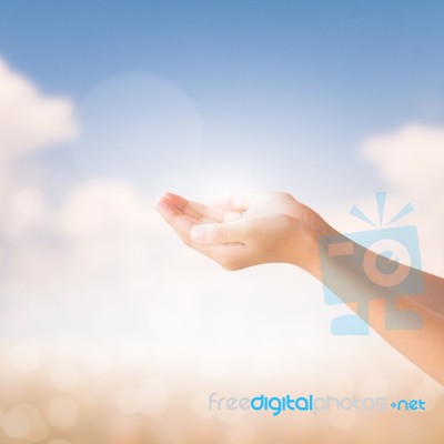 Hands Of Little Girl On Natural Background Stock Photo