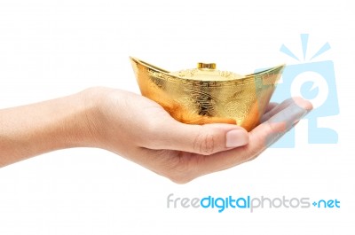 Hands With Chinese Gold Stock Photo