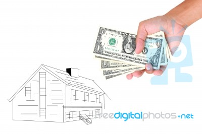 Hands With Money And Miniature House Stock Photo