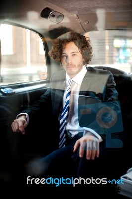 Handsome Business Corporate Inside Taxi Cab Stock Photo