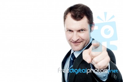 Handsome Businessman Pointing At You Stock Photo