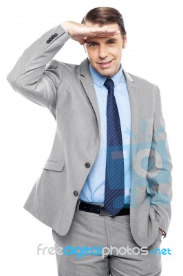 Handsome Businessman Watching Something Closely Stock Photo