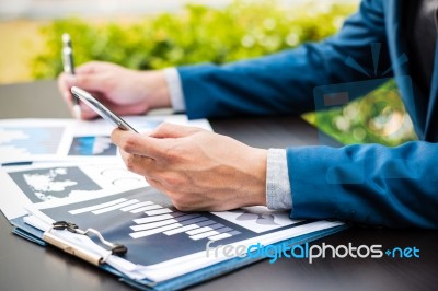 Handsome Businessman Wearing Suit And Using Modern Laptop Outdoo… Stock Photo