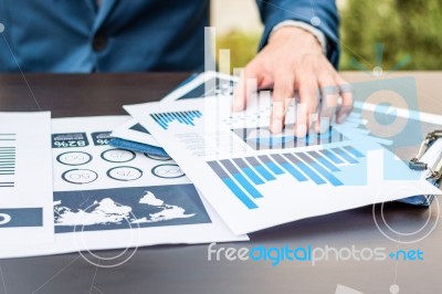 Handsome Businessman Wearing Suit And Using Modern Laptop Outdoo… Stock Photo