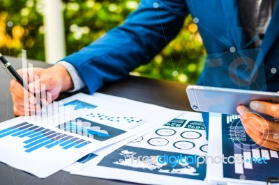 Handsome Businessman Wearing Suit And Using Modern Laptop Outdoo… Stock Photo