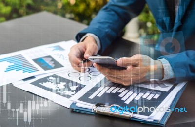 Handsome Businessman Wearing Suit And Using Modern Laptop Outdoo… Stock Photo