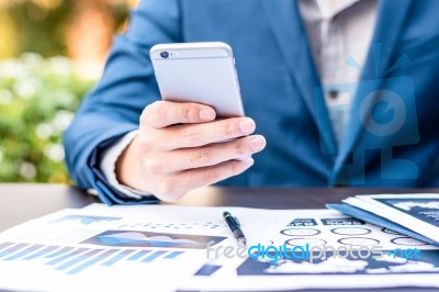 Handsome Businessman Wearing Suit And Using Modern Laptop Outdoo… Stock Photo