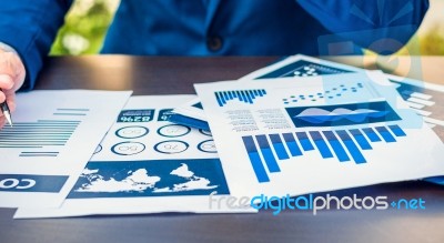 Handsome Businessman Wearing Suit And Using Modern Laptop Outdoo… Stock Photo