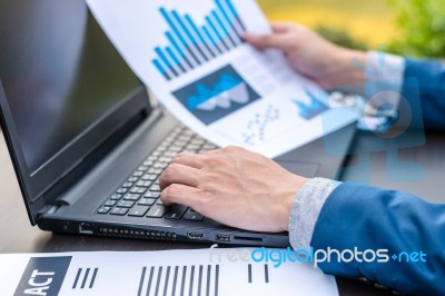 Handsome Businessman Wearing Suit And Using Modern Laptop Outdoo… Stock Photo