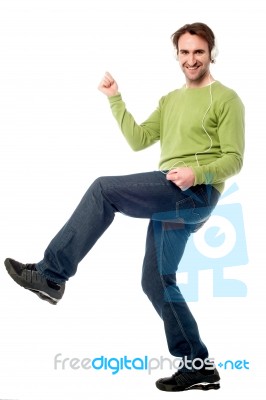 Handsome Casual Guy Dancing Stock Photo