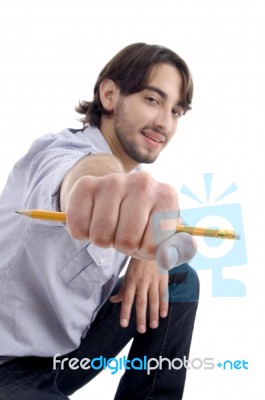 Handsome Cool Man Showing Pencil Stock Photo