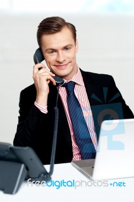 Handsome Corporate Man Communicating Stock Photo