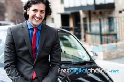 Handsome Corporate Man Posing Casually Stock Photo