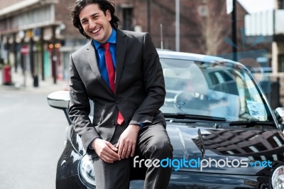 Handsome Corporate Man Posing Casually Stock Photo