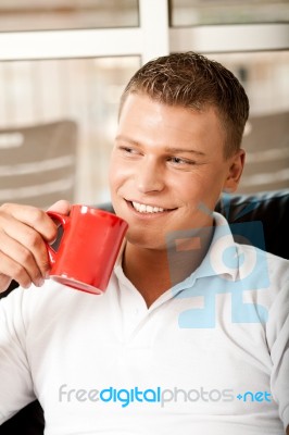 Handsome Guy Enjoying Coffee Stock Photo